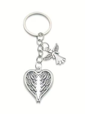 Guardian angel silver Keychain Zinc alloy 
Features an angel and heart NWT